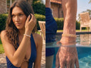 A man and woman wearing Citrine bracelet by a swimming pool