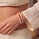 The Ivory 4mm bracelet paired with Burnt Orange and Snow 4mm bracelets