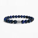 Blue tiger eye beaded bracelet with a brushed silver logo bead