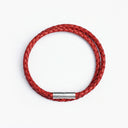 Red braided leather bracelet with silver clasp overhead view