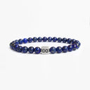 Lapis lazuli beaded bracelet with a brushed silver logo bead