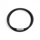 Black lizard print bracelet with a silver clasp overhead view