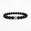 Matte black onyx beaded bracelet with round sterling silver bead