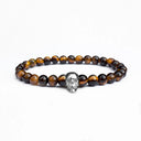 Tigers eye beaded bracelet with a silver skull motif